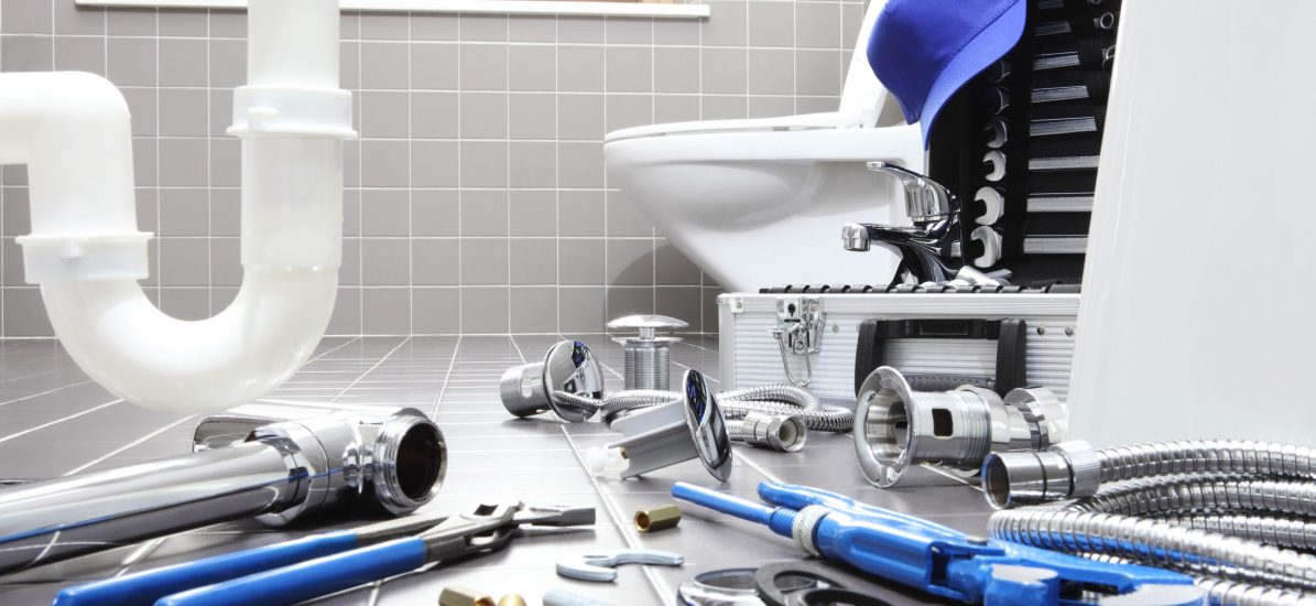 plumber tools and equipment in a bathroom, plumbing repair service, assemble and install concept
